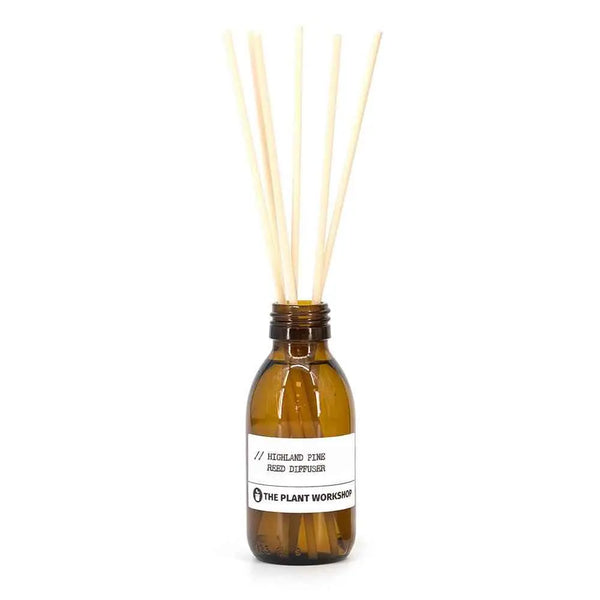 Highland Pine Reed Diffuser in amber glass bottle with fibre reeds