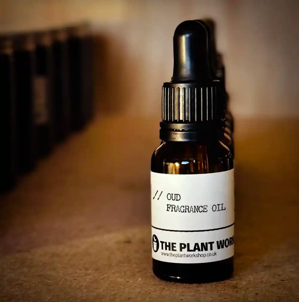 Oud Fragrance Oil in amber glass dropper bottle