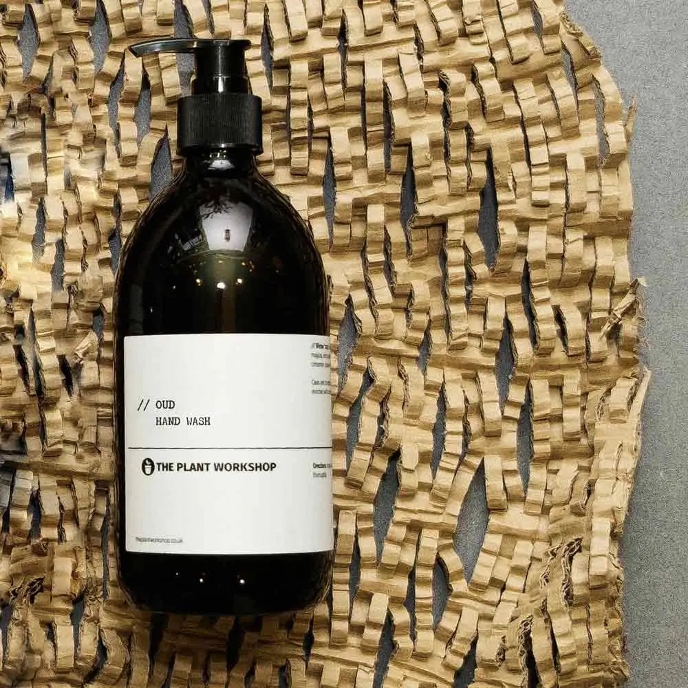 Oud Hand Wash in amber glass bottle