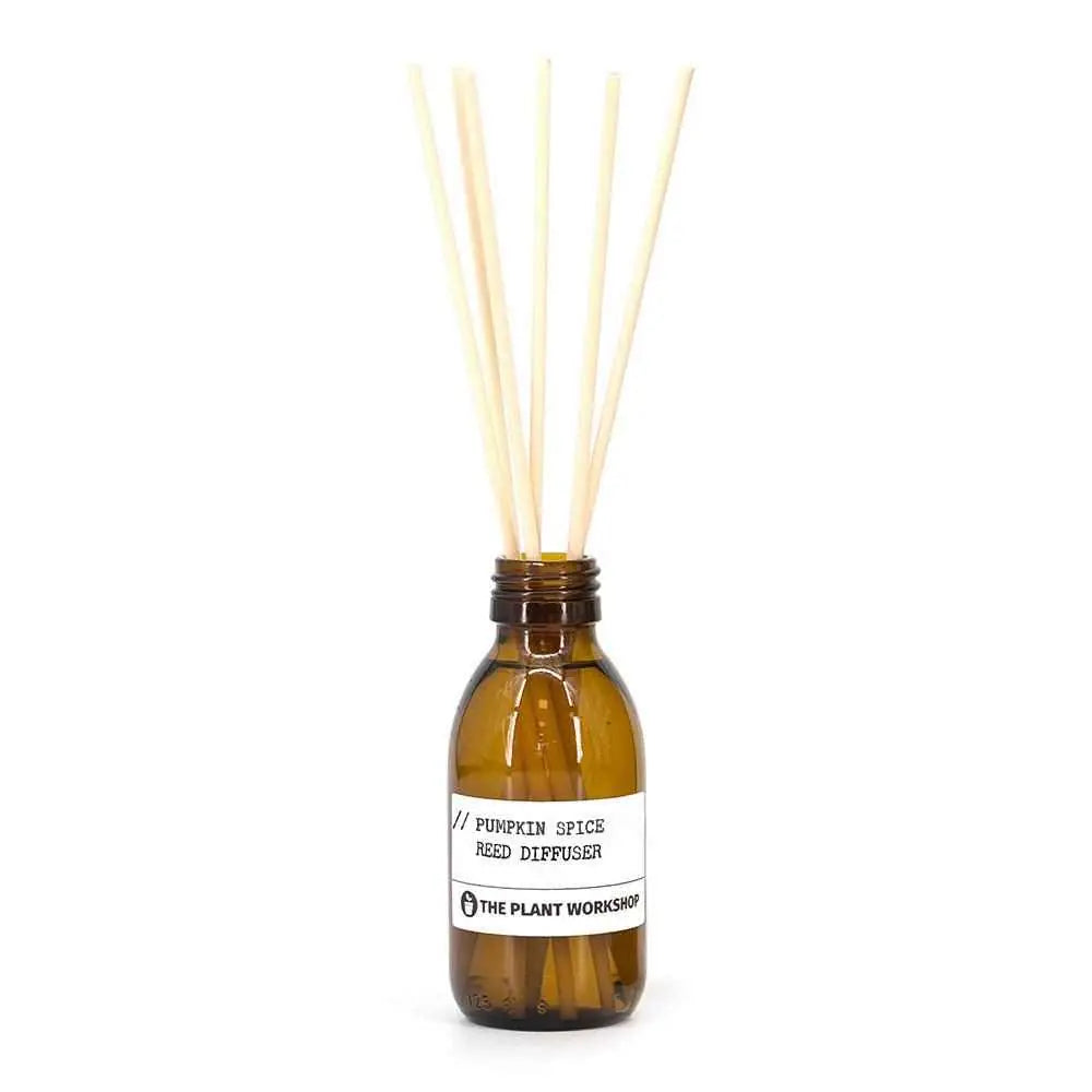 Pumpkin Spice Reed Diffuser in amber glass bottle with fibre reeds