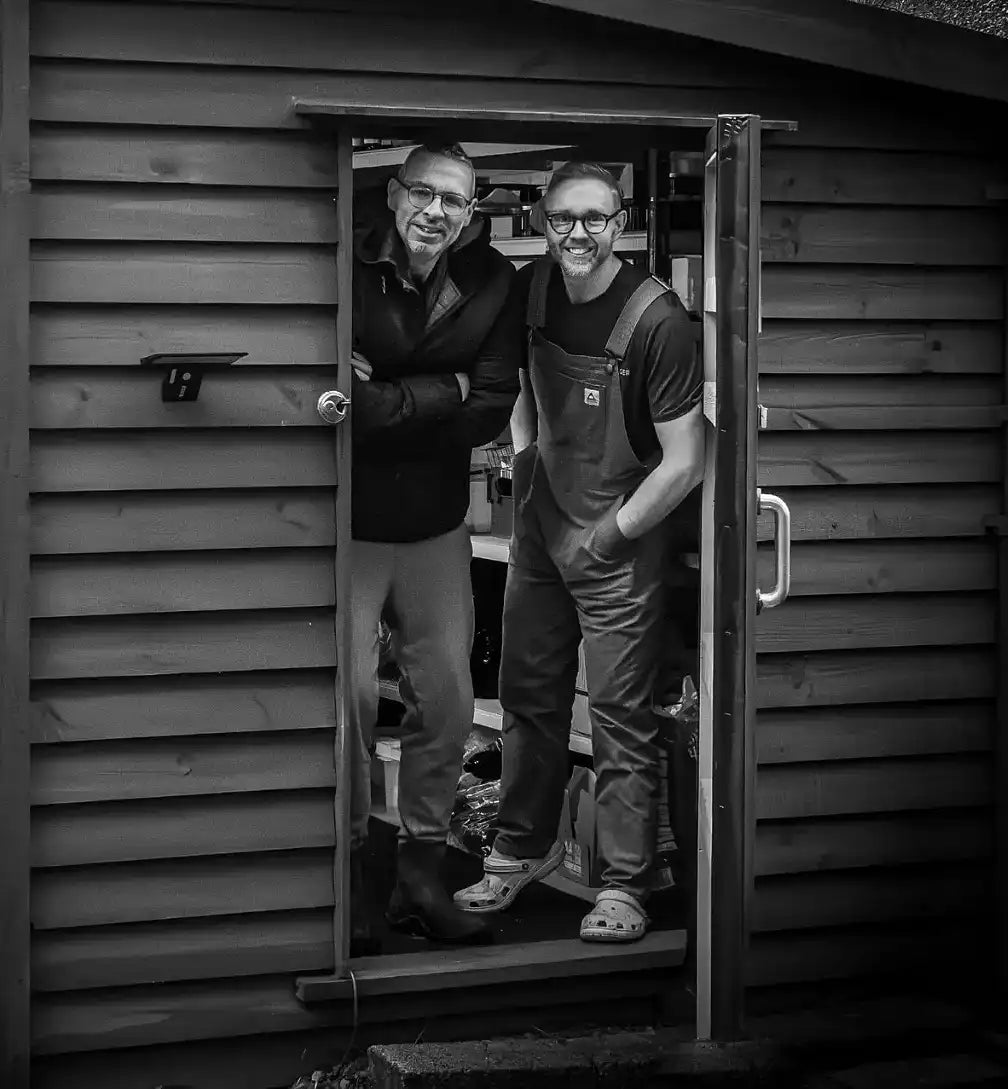 Dave and Steve standing in the doorway of The Plant Workshop in the Scottish Highlands.