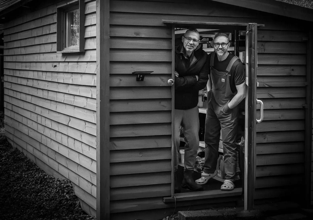 Dave and Steve standing in the doorway of The Plant Workshop in the Scottish Highlands.