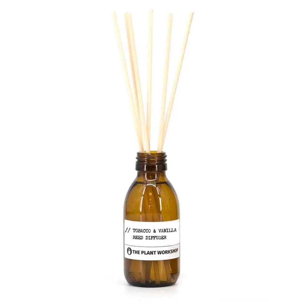 Tobacco &amp; Vanilla Reed Diffuser in amber glass bottle with fibre reeds