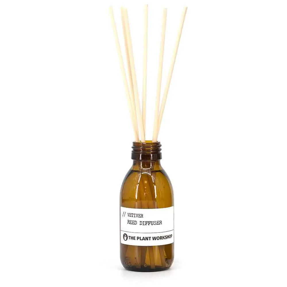 Vetiver Reed Diffuser in amber glass bottle with fibre reeds