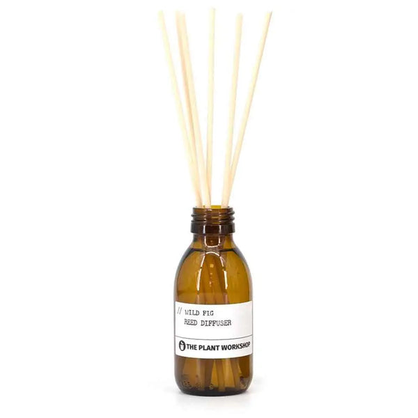 Wild Fig Reed Diffuser in amber glass bottle with fibre reeds